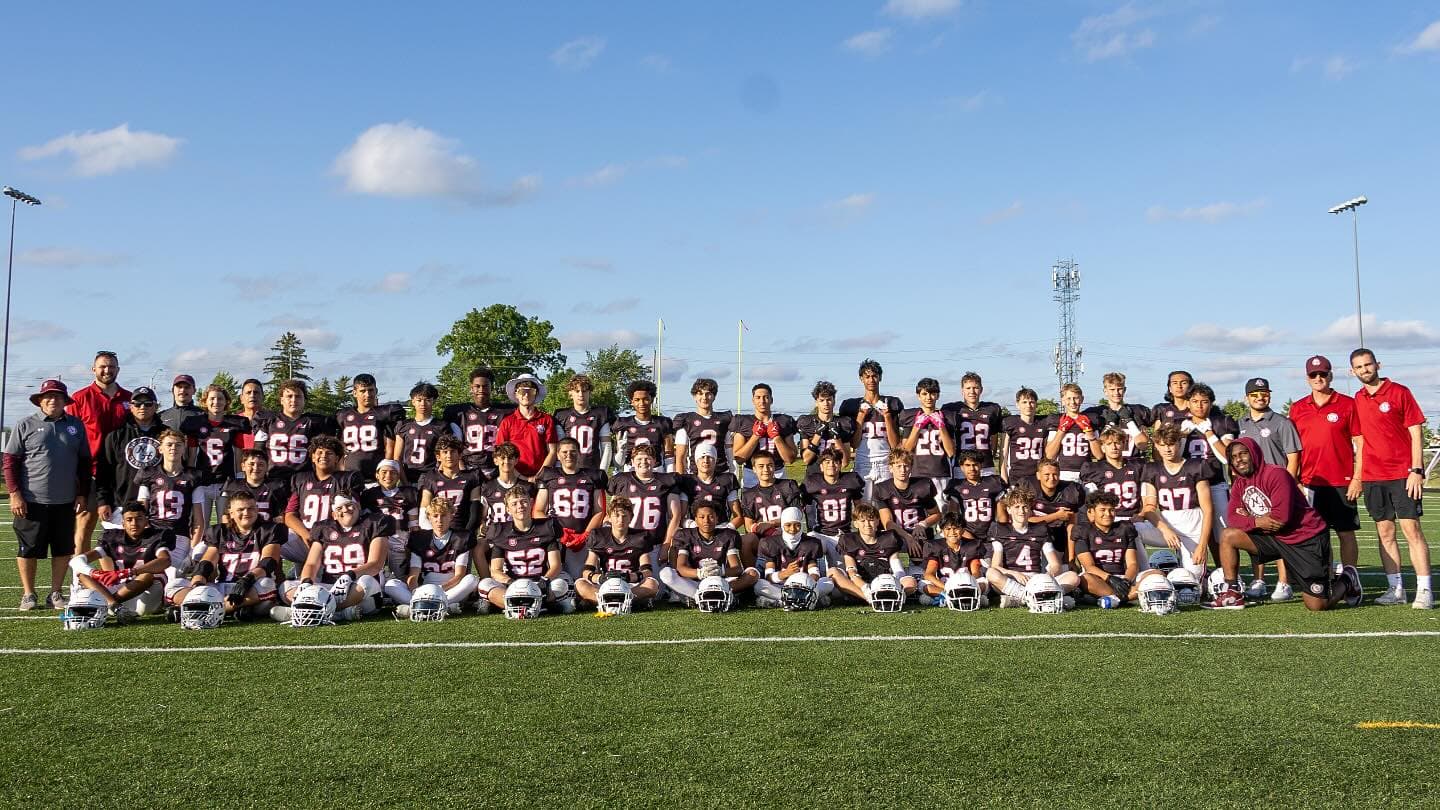 North Halton Tide U14 football team group photo on an outdoor field during the 2025 season.